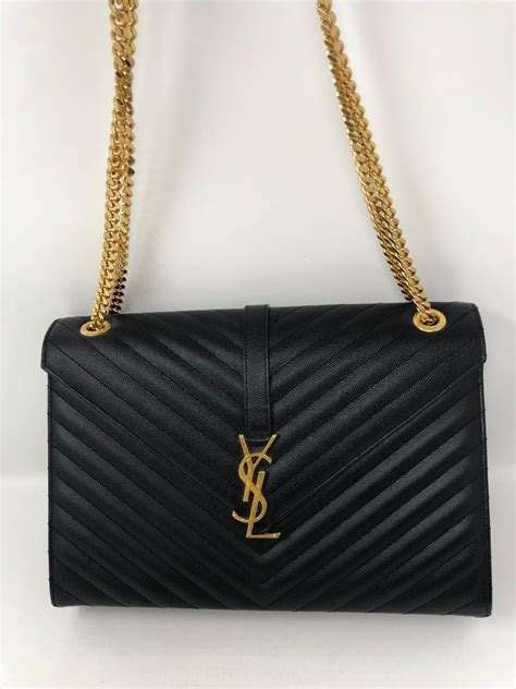 ysl black bag gold hardware|ysl black bag with tassel.